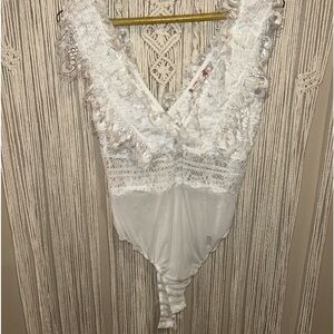 Lace white onesie with ruffles